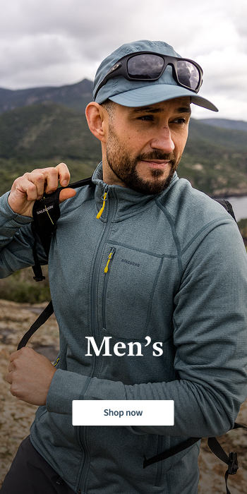 Men wearing a fleece, pack, cap and sunglasses in the mountain from the new season collection